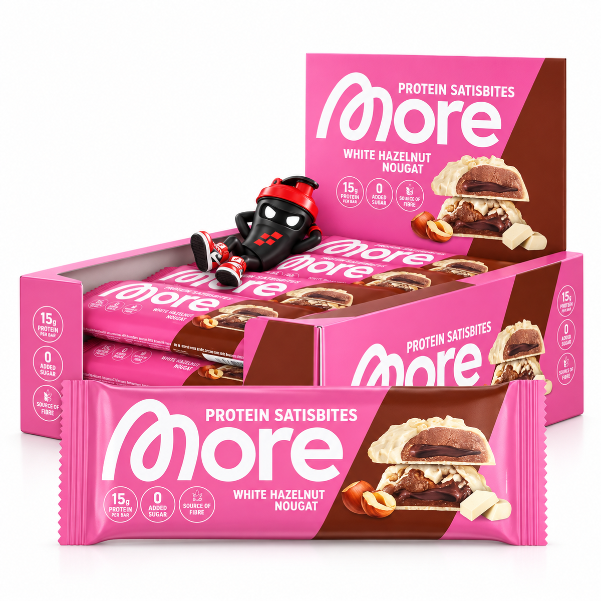 More Nutrition Protein Satisbites 2x25g, Pink-braunes Display White Hazelnut Nougat mit verpackten Riegeln und Shaker-Maskottchen.